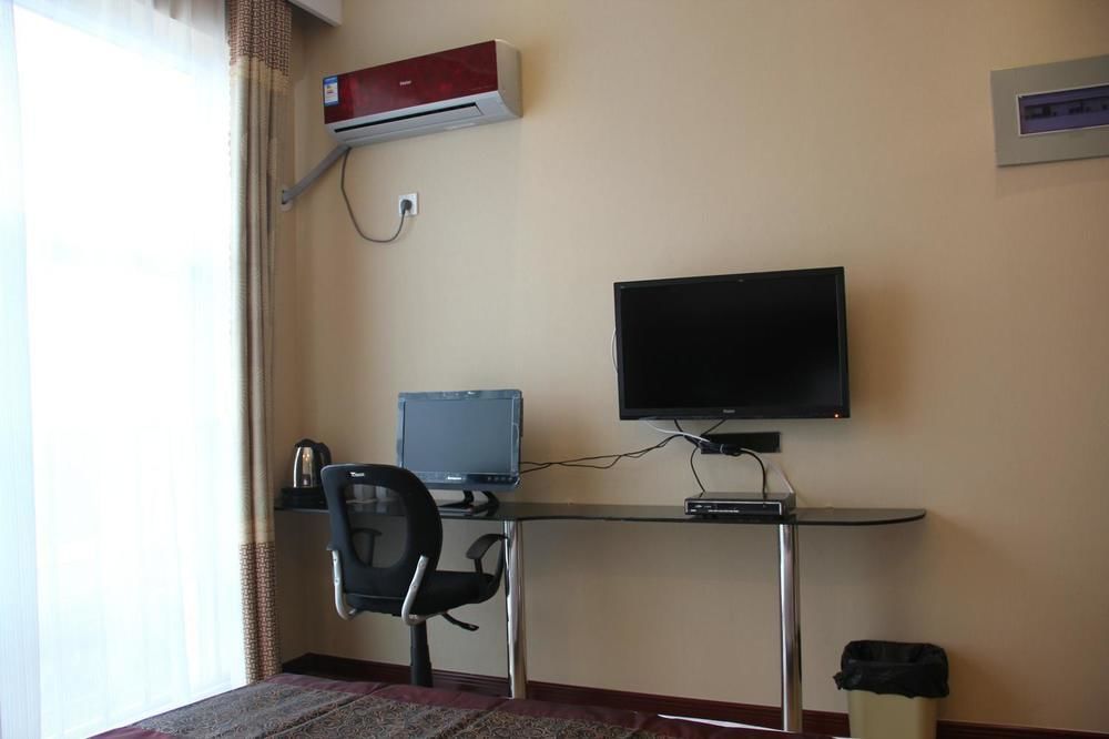 Super 8 Hotel Цзинань Экстерьер фото